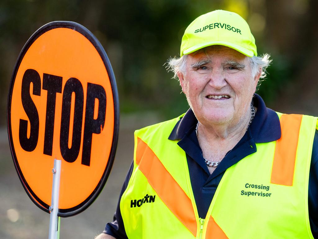 Crossing Supervisor John Goulden has been banned from giving high-fives to children. Picture: Jason Edwards