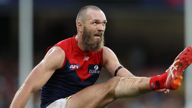 Gawn launches a goal during Melbourne’s last-quarter onslaught against Hawthorn.