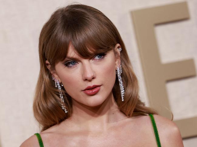 Taylor Swift at the Golden Globes. (Photo by Michael TRAN / AFP)