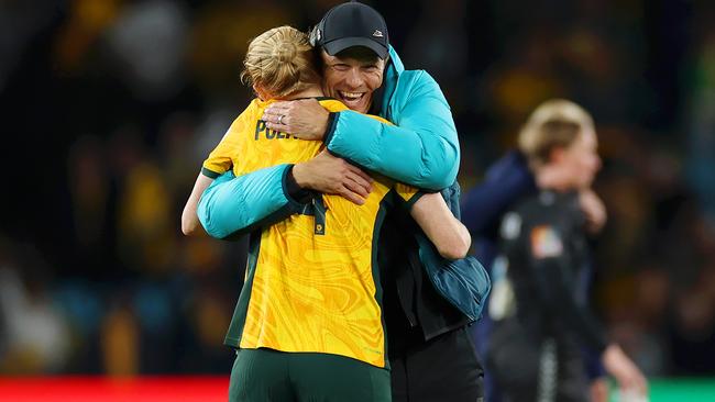 Clare Polkinghorne of Australia is congratulated by head coach Tony Gustavsson