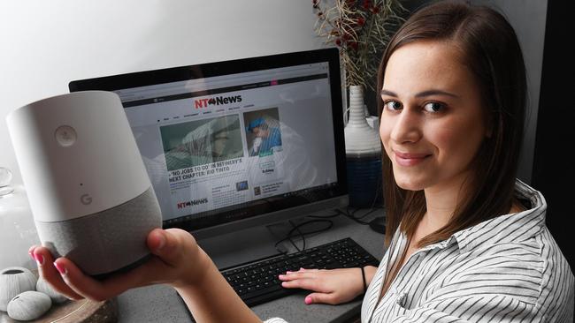 Darwin’s Yasmin Budack tries out  the stylish new Google Home device. Picture: Katrina Bridgeford