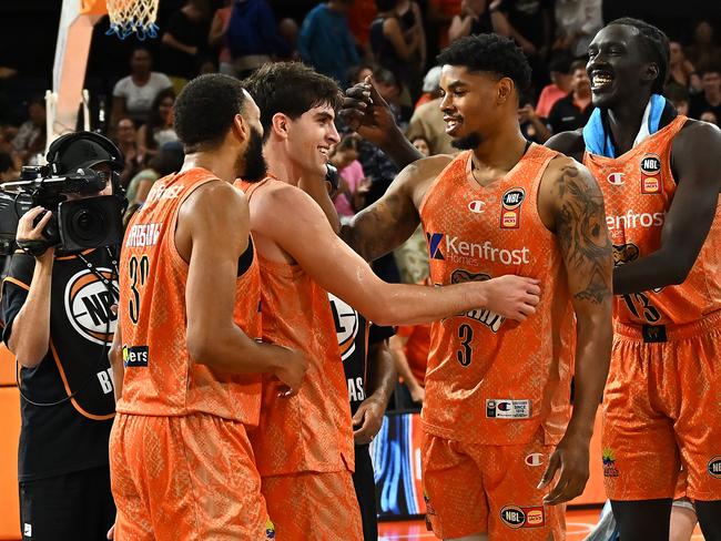 The Cairns Taipans celebrate after ending the Brisbane Bullet’s slim finals hopes. Picture: Getty Images