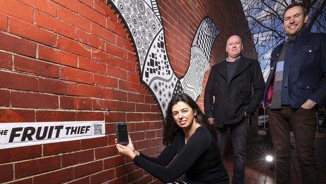 Croydon’s Marta Makkai with Roger Archbold and Andy Drewitt at the launch of street art mural, the Fruit Thief. Photo: Daniel Pockett