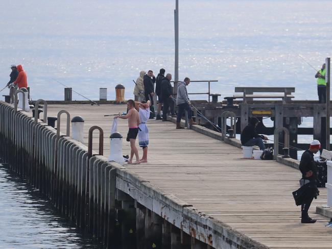 People on the pier in Portsea. Picture: Alex Coppel.