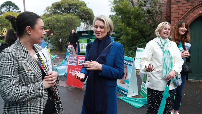 Liberal Katherine Deves, second left, and independent MP Zali Stegall, third left, cross paths in Warringah. Picture: John Feder