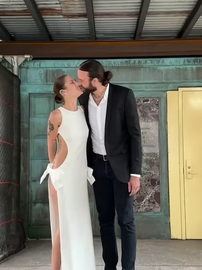 Catherine McNeil marries Miles Plumlee in risque wedding dress