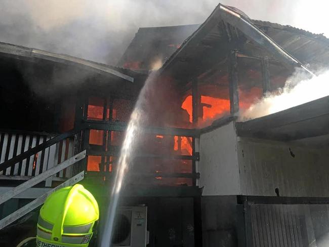 Firefighters extinguish a ferocious blaze which tore through a home in Murwillumbah on Friday afternoon.