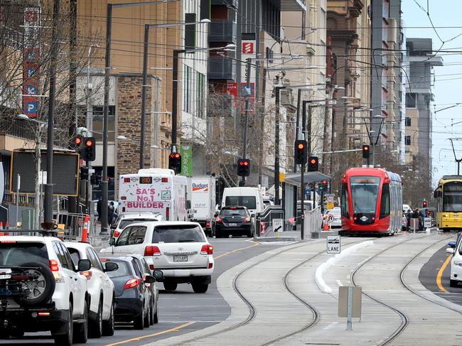 Trams going up and down North Terrace near the old RAH, on practice runs. 12 September 2018. (AAPImage/Dean Martin)