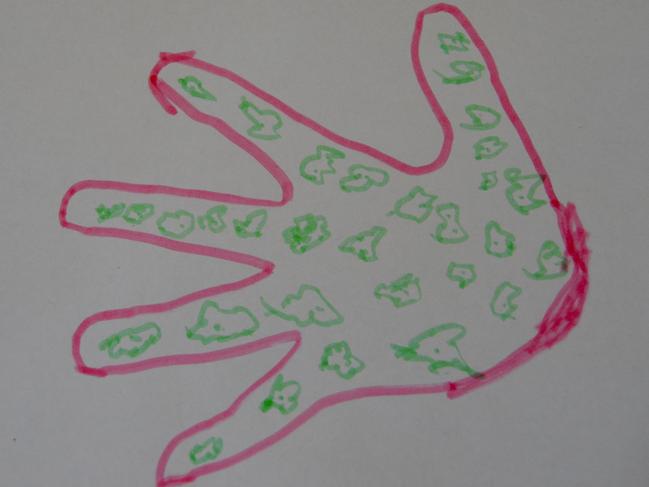 Child’s-eye view: “Here is my hand covered in germs.”