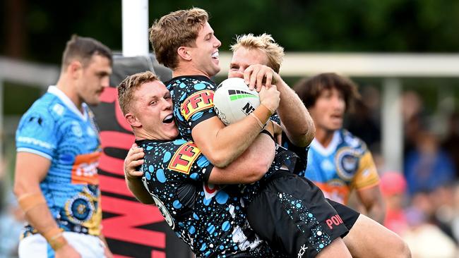 Blayke Brailey of the Sharks congratulated after scoring a try (Photo by Bradley Kanaris/Getty Images)