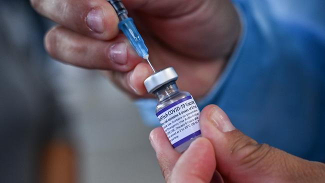 A nurse prepares a dose of the Pfizer. Picture: Joaquin SARMIENTO/AFP