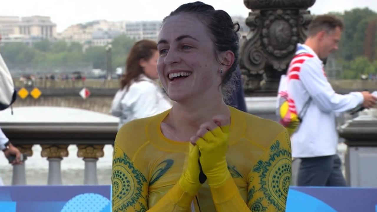 Grace Brown from Australia celebrates winning the cycling individual time trial at the 2024 paris Olympic games.