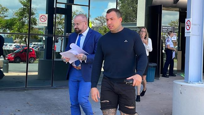 Alleged Mongol Harley Barbaro and lawyer Campbell MacCaullum outside Southport Magistrates Court. Picture: Lea Emery