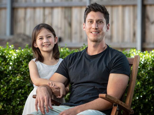 Alex Sparkes and his daughter Maisy, 7, pictured at home in Cherrybrook. Alex lost his wife Hayley to pancreatic cancer in 2018 when Maisy was just 3. Picture: Julian Andrews