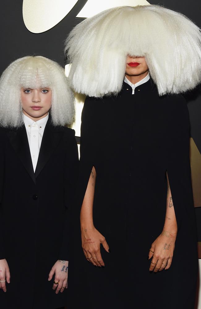 What the? ... Dancer Maddie Ziegler and singer/songwriter Sia (right) arrived looking like this!