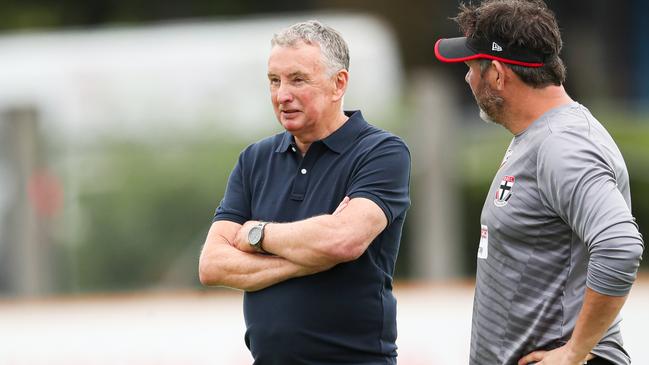 Merrick and Ratten watch the players go through their paces at training. Picture: supplied