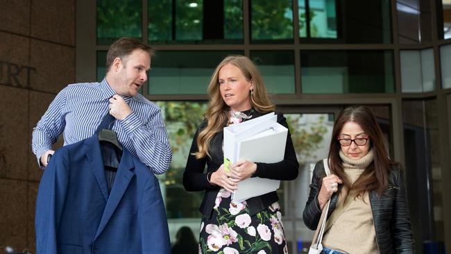 Ms Smit leaves court with lawyer Gareth Rogers. Picture: NCA NewsWire / Nicki Connolly