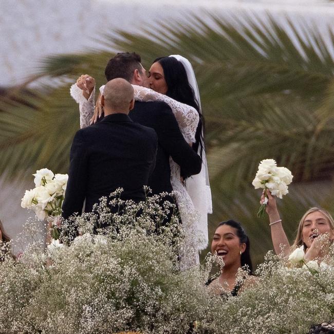 The crowd cheers for a wedding almost seven years in the making. Picture: HEM / BACKGRID