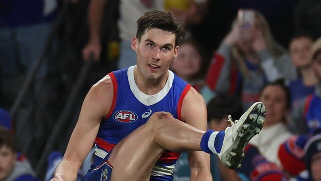 MELBOURNE, AUSTRALIA - AUGUST 18: Sam Darcy of the Bulldogs kicks for goal during the round 23 AFL match between Western Bulldogs and North Melbourne Kangaroos at Marvel Stadium, on August 18, 2024, in Melbourne, Australia. (Photo by Daniel Pockett/Getty Images)