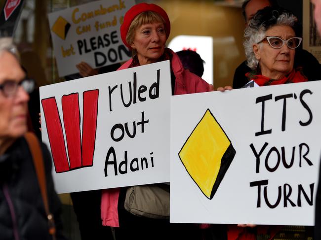 Protesters thank Westpac at a #StopAdani protest against CommBank regarding business with Adani at a Westpac Branch in Melbourne, Tuesday, May 9, 2017. (AAP Image/Tracey Nearmy) NO ARCHIVING,