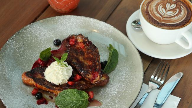 Some of the food and ambience at Daymaker Espresso at Miami. French Toast. Picture Glenn Hampson