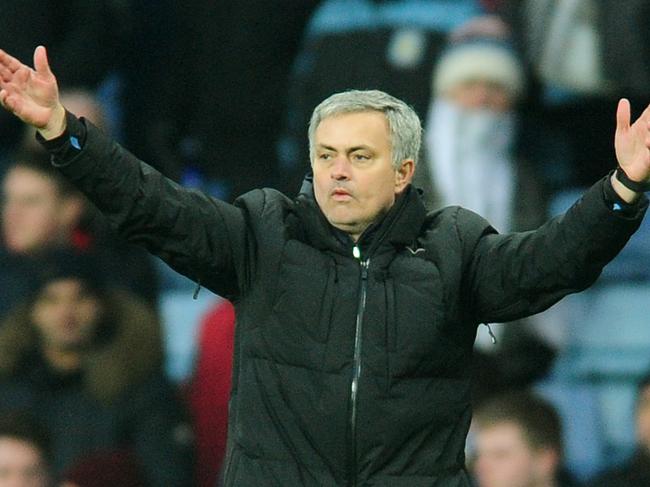 Chelsea manager Jose Mourinho gestures to fans after Chelsea beat Villa 2-1 during the English Premier League soccer match between Aston Villa and Chelsea at Villa Park, Birmingham, England, Saturday, Feb 7, 2015. (AP Photo/Rui Vieira)