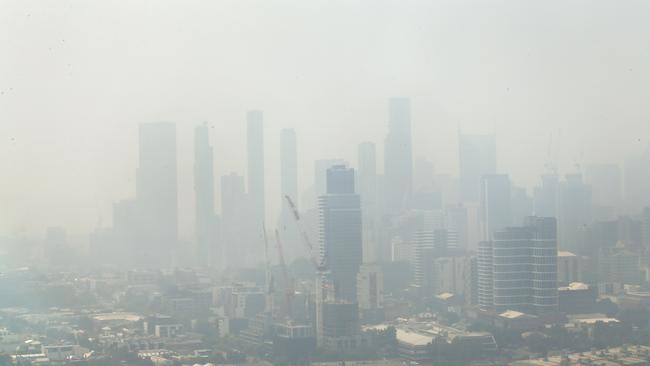 Bushfire smoke blankets Melbourne’s CBD and suburbs, as seen from the Melbourne Star Observation Wheel. Picture: David Caird