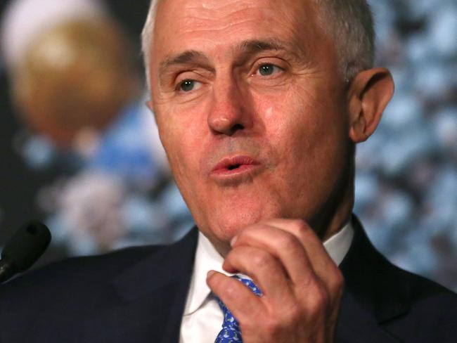 Australian Prime Minister Malcolm Turnbull gestures as he speaks during the Knowledge Nation Summit in Sydney, Wednesday, Dec. 10, 2015. (AAP Image/David Moir) NO ARCHIVING