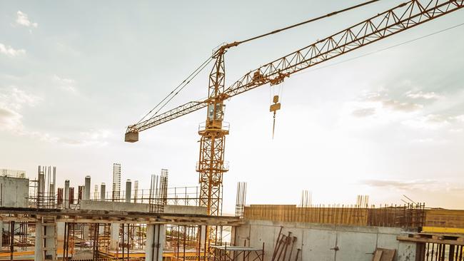 Cranes like these still dot the Gold Coast skyline but they’re working on smaller projects than two years ago. Photo: iStock