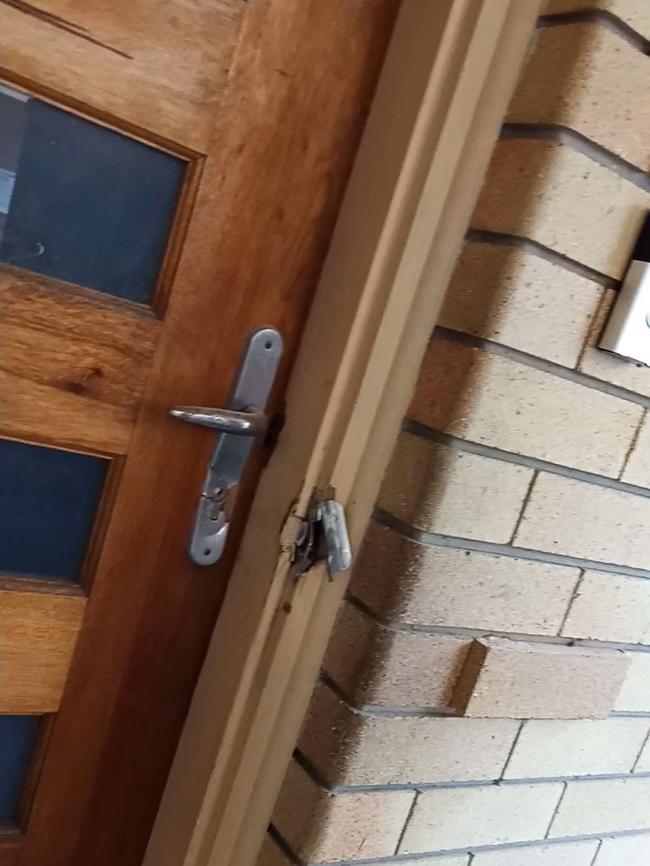 The damage done to the door of a Burleigh Heads home during at attack allegedly done by David Joseph Parker. Picture: Supplied