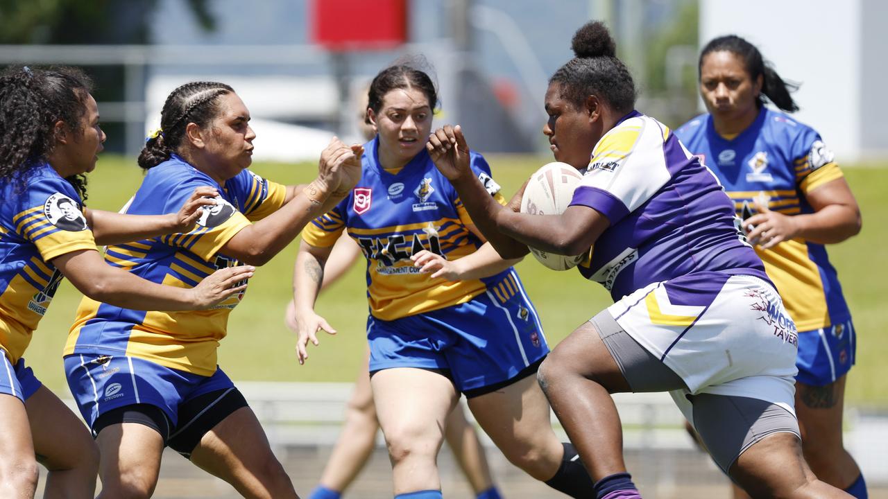 Storm's Martha Nomoa runs hard into the Kangaroos' defensive line in the 2022 Women's grand final match between the Edmonton Storm and the Cairns Kangaroos at Barlow Park. Picture: Brendan Radke