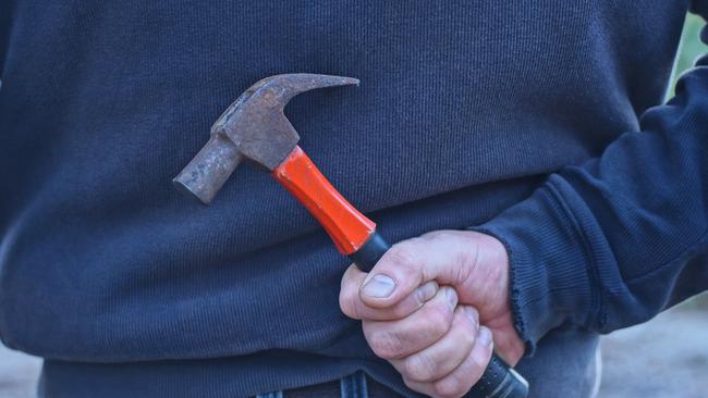 A Ringwood woman feared for her life after a man she allowed to stay in her house repeatedly struck her with a hammer.