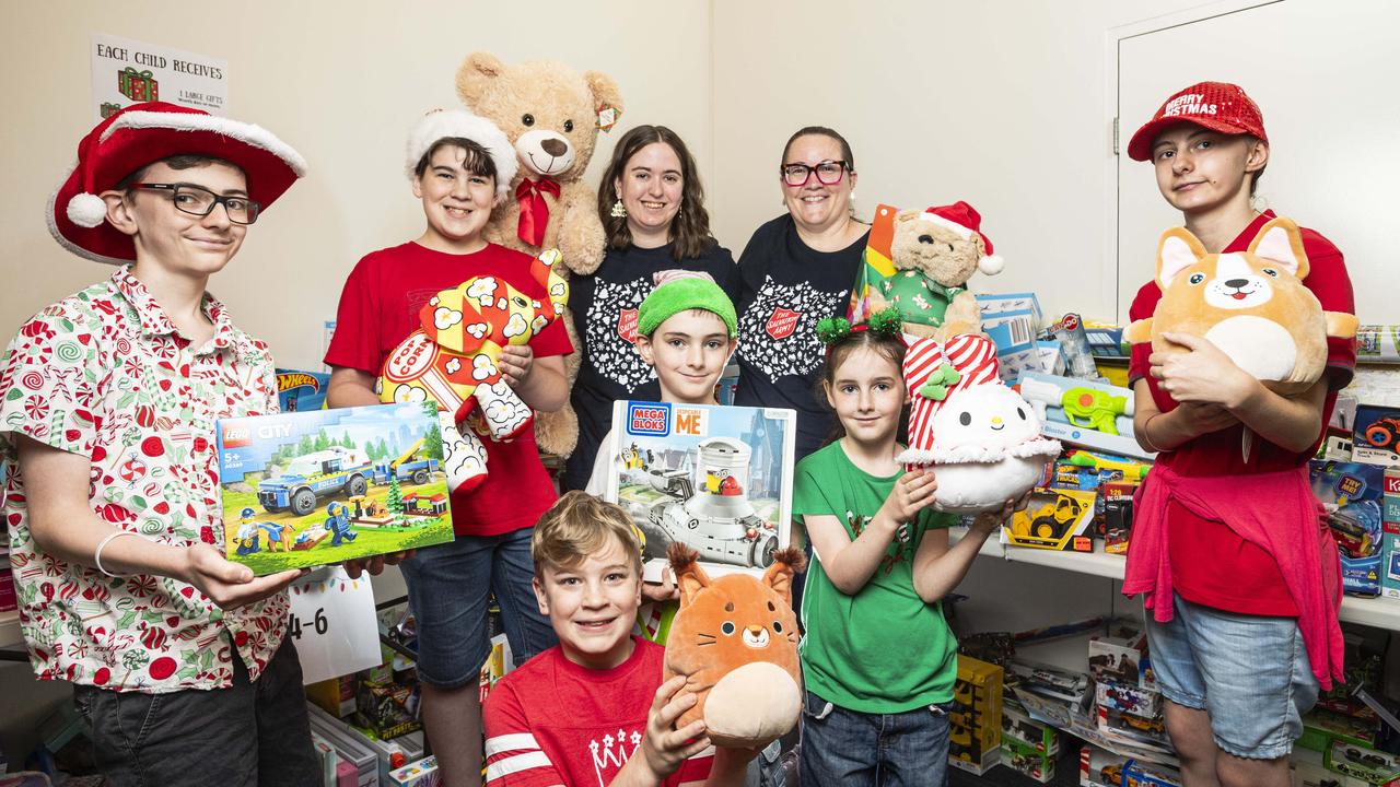 Helping to pack Salvation Army Christmas hampers are (from left) Micha Robinson, Zach Reid, Joel Reid, Natalie Versace, Jesse Robinson, Alana Reid, Naomi Robinson and Chloe Robinson, Wednesday, December 11, 2024. Picture: Kevin Farmer