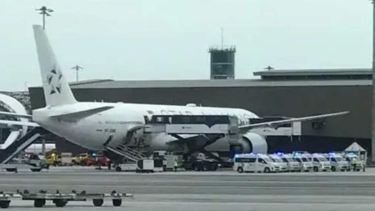 The plane upon arrival with ambulances lined up. Picture: Twitter