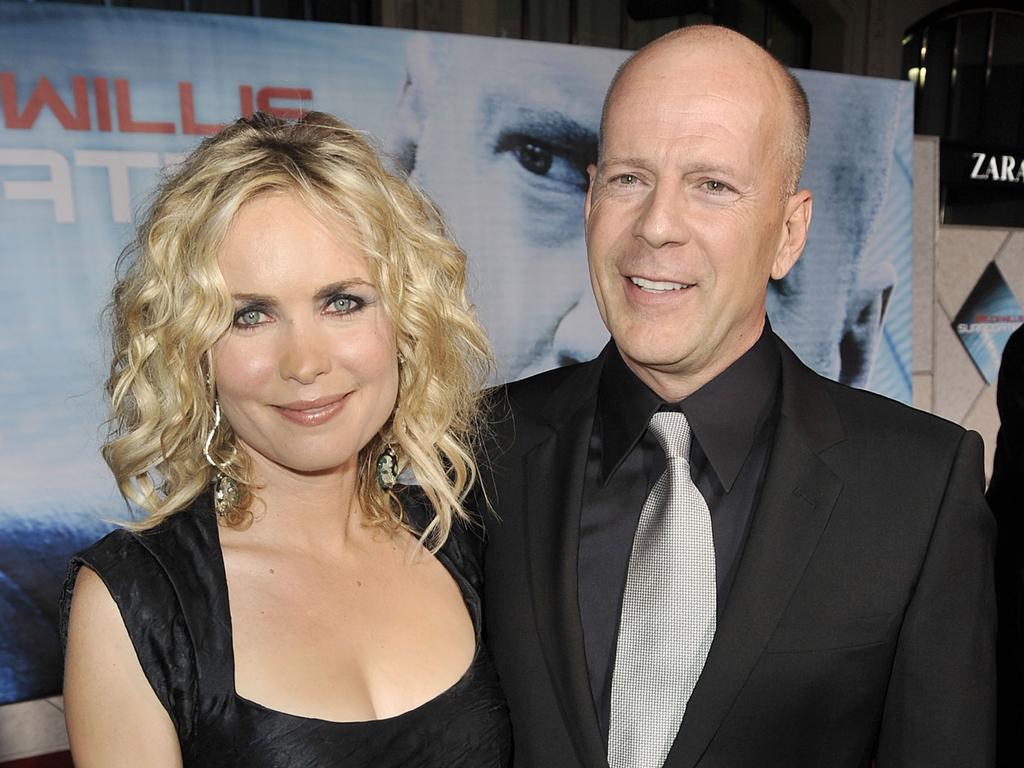 With Bruce Willis at the LA premiere of Surrogates in 2009. Picture: Kevin Winter/Getty Images