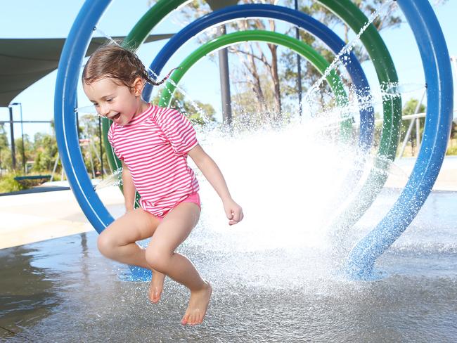 Sienna O'Dwyer plays at a water park in Blacktown. Picture: Rohan Kelly