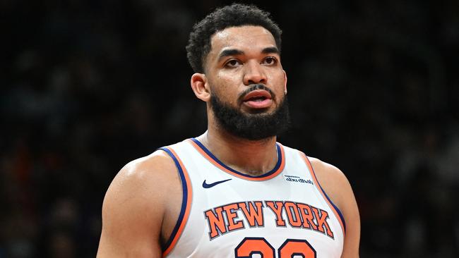 ATLANTA, GEORGIA - APRIL 05: Karl-Anthony Towns #32 of the New York Knicks looks on against the Atlanta Hawks during the fourth quarter at State Farm Arena on April 05, 2025 in Atlanta, Georgia. NOTE TO USER: User expressly acknowledges and agrees that, by downloading and or using this photograph, User is consenting to the terms and conditions of the Getty Images License Agreement. (Photo by Paras Griffin/Getty Images)