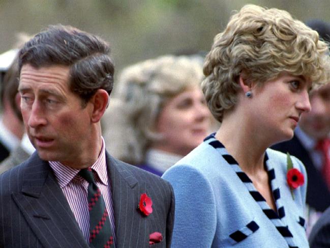 NOT FOR PUBLICATION TIL SUNDAY JULY 30, 2017 - EXCLUSIVE ARTHUR EDWARDS Description=LON31:BRITAIN-ROYALS:SEOUL,28FEB96 - NOV92 FILE PHOTO - Princess Diana and Prince Charles look in different directions during a Korean War commemorative service in NOV92. The Princess of Wales has agreed to a request for a divorce from her estranged husband her spokesman announced February 28.# dmo/Photo by Arthur Edwards Description=(Princess Diana Life Package)