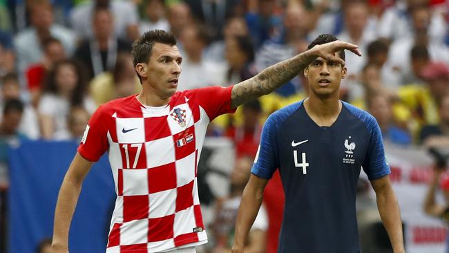 Croatia's Mario Mandzukic, left, gestures next to France's Raphael Varane during the World Cup final at the Luzhniki Stadium in Moscow. Photo: AP