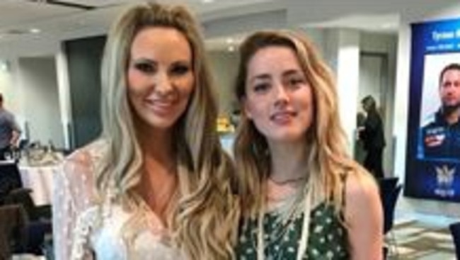 Kimberley White and Amber Heard at the Titans match on Sunday. Picture: Instagram..