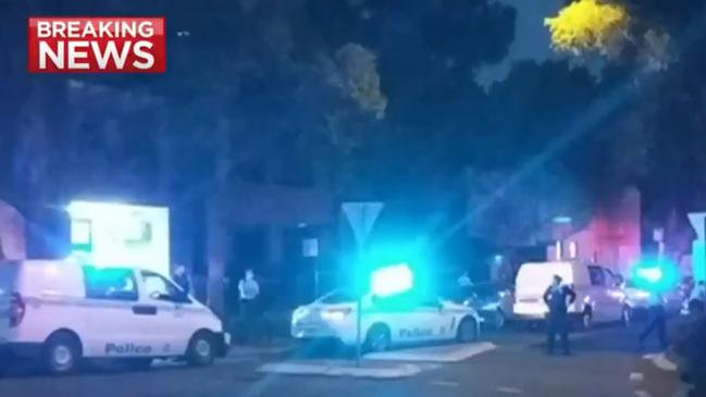 Police vehicles rushed to the scene after reports of an officer being run down. Picture: 7News