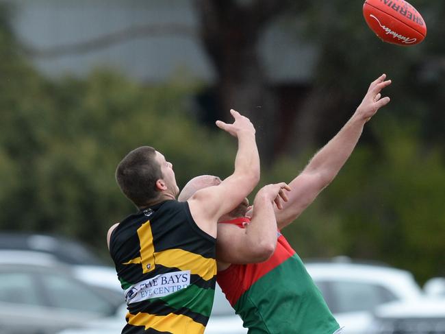 Dromana’s Billy Geurts contests a boundary throw in with Gabriel. Picture: Chris Eastman