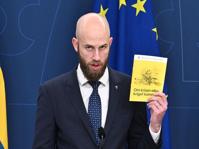 Sweden’s Minister for Civil Defence Carl-Oskar Bohlin with the preparedness booklet “If the crisis or war comes”. Picture: AFP