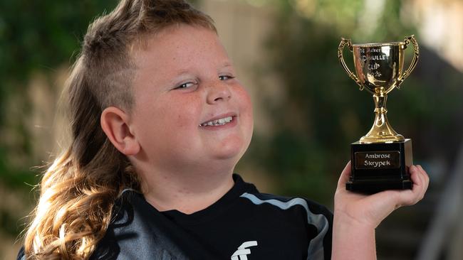 22nd of January 2025  - Mullet Cup Winner Ambrose Skyrypek, 8, at home in Aldinga Beach with parents Kim and Michael. Photo: Naomi Jellicoe