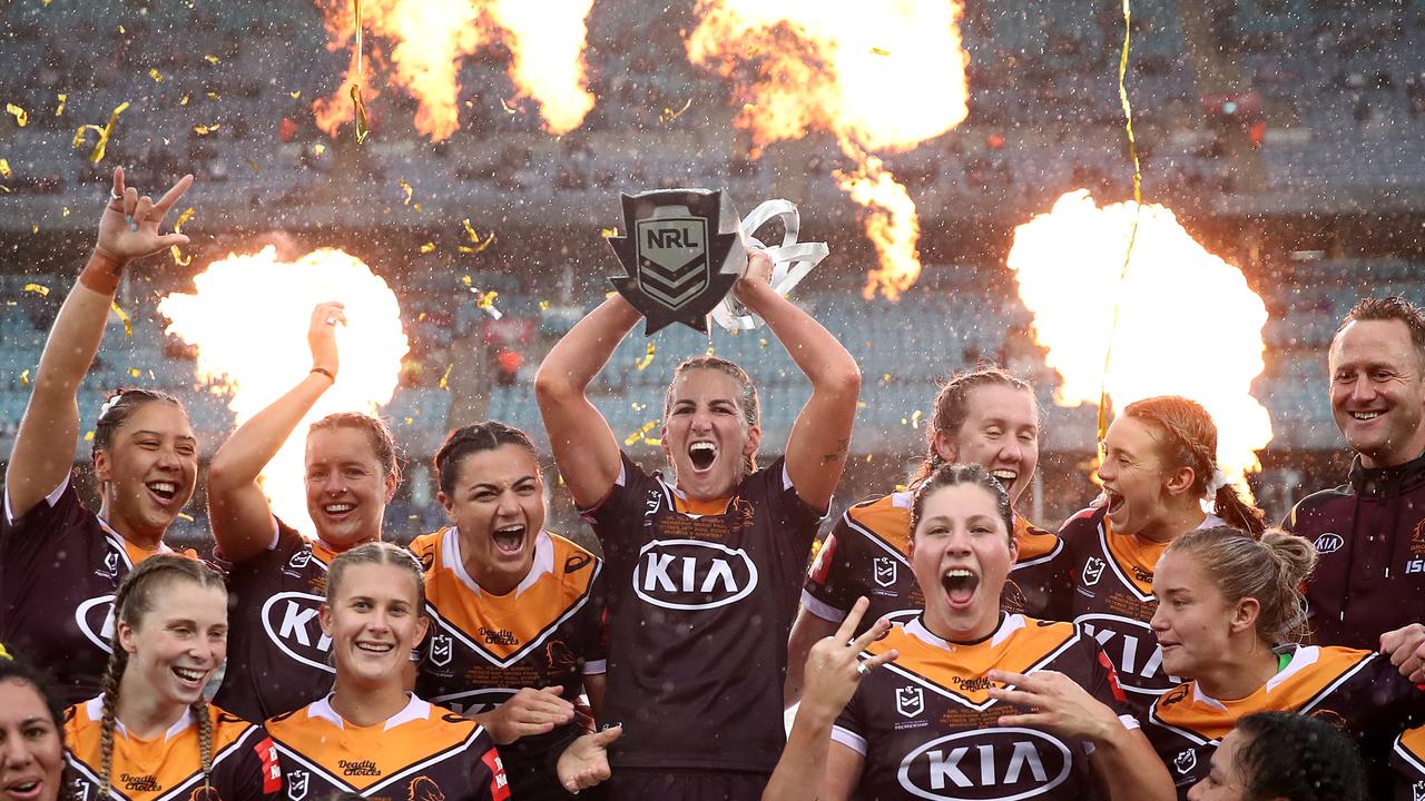 Ali Brigginshaw of the Broncos holds aloft the Premiership trophy.