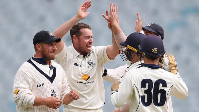 Jon Holland celebrates a wicket during Western Australia’s first innings.