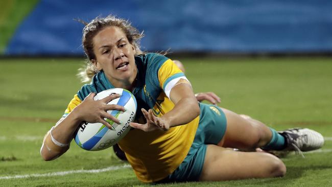 Australia's Evania Pelite, scores a try during the women's rugby sevens gold medal match against New Zealand at the Summer Olympics in Rio de Janeiro, Brazil, Monday, Aug. 8, 2016. (AP Photo/Themba Hadebe)