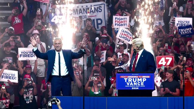 Donald Trump, right, and Robert F. Kennedy Jr on stage during a campaign rally in August. Picture: AFP