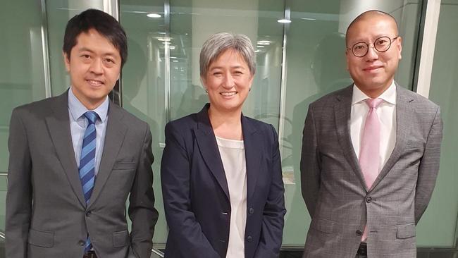 Ted Hui, left, and Kevin Yam with Foreign Minister Penny Wong in January.