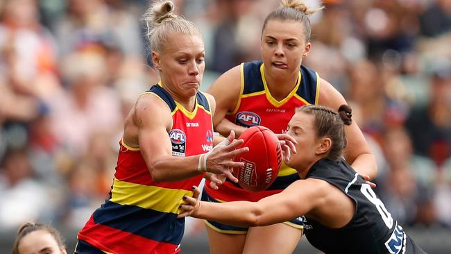 Adelaide and Carlton compete in last year’s AFLW grand final.